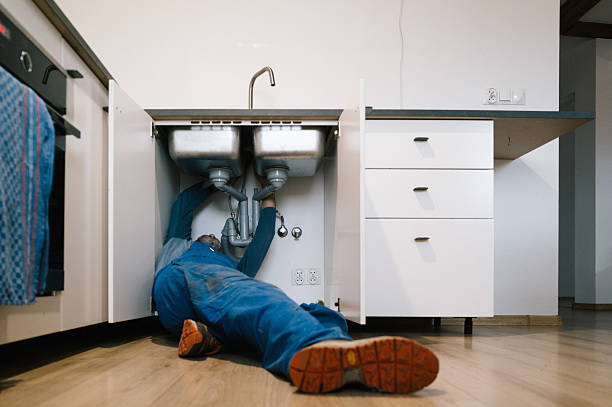 Professional Emergency Plumber technician working in Afton, WI